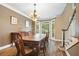 Dining room with hardwood floors, bay window, and traditional furnishings at 1488 Lachona Ne Ct, Atlanta, GA 30329