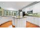 Spacious kitchen with white cabinets, granite countertops, and stainless steel appliances at 1488 Lachona Ne Ct, Atlanta, GA 30329
