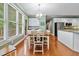 Kitchen and breakfast nook with views of the backyard through many windows at 1488 Lachona Ne Ct, Atlanta, GA 30329