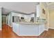 Open kitchen featuring granite countertops, stainless steel appliances, and light hardwood floors at 1488 Lachona Ne Ct, Atlanta, GA 30329
