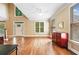 Bright living room with large windows, hardwood floors, and a fireplace at 1488 Lachona Ne Ct, Atlanta, GA 30329