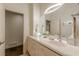 Clean bathroom with decorative lighting, sleek vanity, and neutral color scheme at 1757 E Clifton Ne Rd, Atlanta, GA 30307