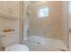 Full bathroom with tiled shower over tub and glass door at 1757 E Clifton Ne Rd, Atlanta, GA 30307