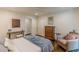 Comfortable bedroom with hardwood floors, chair, dresser, and double door closet at 1757 E Clifton Ne Rd, Atlanta, GA 30307
