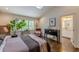 Bright bedroom with ensuite bathroom access, hardwood floors and large windows at 1757 E Clifton Ne Rd, Atlanta, GA 30307