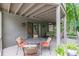 Relaxing outdoor deck featuring comfortable seating and views of the surrounding green landscape at 1757 E Clifton Ne Rd, Atlanta, GA 30307