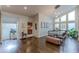 Open dining room with wood floors, modern chandelier, and lots of natural light at 1757 E Clifton Ne Rd, Atlanta, GA 30307