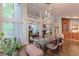 Large dining area with abundant natural light, glass dining table, and open floorplan at 1757 E Clifton Ne Rd, Atlanta, GA 30307