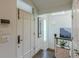 Bright foyer with a decorative front door, light walls, and dark wood floors at 1757 E Clifton Ne Rd, Atlanta, GA 30307