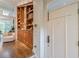 Welcoming foyer with built-in shelving and hardwood floors at 1757 E Clifton Ne Rd, Atlanta, GA 30307