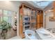 Gourmet kitchen with stainless appliances, bar seating, and hardwood cabinetry at 1757 E Clifton Ne Rd, Atlanta, GA 30307