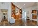 Spacious living room with built-in shelves and hardwood floors at 1757 E Clifton Ne Rd, Atlanta, GA 30307