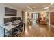 A home office space with a built-in desk, hardwood floors, and modern lighting at 1757 E Clifton Ne Rd, Atlanta, GA 30307