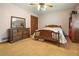 Bedroom features a full sized bed, carpet, large closet, and ceiling fan at 267 Firecreek Rdg, Lawrenceville, GA 30046
