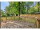 Spacious wooden deck perfect for outdoor entertaining, with a scenic view of the backyard at 267 Firecreek Rdg, Lawrenceville, GA 30046
