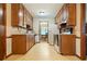 Classic kitchen with vintage cabinets, appliances, and view into dining room at 267 Firecreek Rdg, Lawrenceville, GA 30046