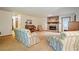 Cozy living room with stone fireplace, comfortable seating, and a grand piano at 267 Firecreek Rdg, Lawrenceville, GA 30046
