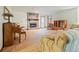 Comfortable living room with a stone fireplace, piano, and ample seating space at 267 Firecreek Rdg, Lawrenceville, GA 30046
