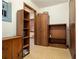 Functional mud room with tile flooring, storage cabinets, and an electrical panel at 267 Firecreek Rdg, Lawrenceville, GA 30046