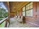 Charming front porch with comfortable seating, offering a relaxing outdoor space at 267 Firecreek Rdg, Lawrenceville, GA 30046