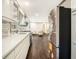 New stainless steel appliances and quartz countertops adorn this modern kitchen at 2695 Peeler Rd, Dunwoody, GA 30360