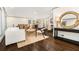 Bright and open living room with hardwood floors and seamless flow to dining and kitchen at 2695 Peeler Rd, Dunwoody, GA 30360