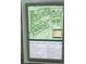 Park map with walking trails, athletic fields, and playground areas at 2695 Peeler Rd, Dunwoody, GA 30360