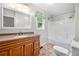 Bright bathroom with shower and tiled flooring at 5065 Nesbit Ferry Ln, Atlanta, GA 30350
