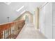 Carpeted hallway with skylights and closet space at 5065 Nesbit Ferry Ln, Atlanta, GA 30350