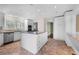Modern kitchen with granite countertops, stainless steel appliances, and a center island at 5065 Nesbit Ferry Ln, Atlanta, GA 30350