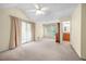 Large main bedroom with vaulted ceiling and walk out balcony at 5065 Nesbit Ferry Ln, Atlanta, GA 30350