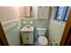 Bathroom featuring retro green tile, a vanity, and plenty of natural light at 5508 Zanola Sw Dr, Mableton, GA 30126
