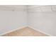 A carpeted walk-in closet with wire shelving and white trim, offering ample storage space at 5380 Bridle Point Pkwy, Snellville, GA 30039