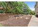 Community dog park area with benches and waste disposal stations at 625 Piedmont Ne Ave # 105, Atlanta, GA 30308