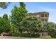 Beautifully landscaped apartment complex with mature trees and manicured grounds at 625 Piedmont Ne Ave # 105, Atlanta, GA 30308