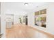 Open living space with modern kitchen, hardwood floors, and a bright airy feel at 625 Piedmont Ne Ave # 105, Atlanta, GA 30308