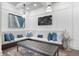 Community lounge area with stylish seating, throw pillows, and modern artwork at 625 Piedmont Ne Ave # 105, Atlanta, GA 30308
