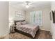 Cozy bedroom with a queen-sized bed, soft lighting, and neutral color palette at , Atlanta, GA 30360
