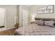 This bedroom has a full sized bed and doorway access to a bathroom at , Atlanta, GA 30360