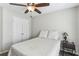 Inviting bedroom with ceiling fan, comfortable bed, and ample natural light from the window at , Atlanta, GA 30360