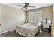 This bright bedroom has a full sized bed, plantation shutters, and an office desk at , Atlanta, GA 30360