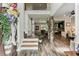 Open foyer featuring hardwood floors, stone columns and an open view to the living areas at , Atlanta, GA 30360