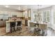 Bright kitchen with an island, stainless steel appliances, and a breakfast nook with bay windows at , Atlanta, GA 30360