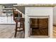 Kitchen island with a wine cooler and seating, perfect for entertaining guests at , Atlanta, GA 30360