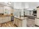 Open concept kitchen with white cabinetry, granite countertops, and an island at , Atlanta, GA 30360