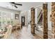 Spacious living room showcasing stone columns, hardwood floors and natural light at , Atlanta, GA 30360
