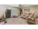 Comfortable living area featuring plush seating, neutral decor, and ample natural light from large window at , Atlanta, GA 30360