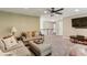 Upstairs seating area with plush sofa, ottoman, and a large tv perfect for entertaining at , Atlanta, GA 30360