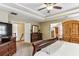 This spacious primary bedroom has a tray ceiling and doorway access to an upstairs hallway at , Atlanta, GA 30360