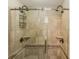 Luxurious glass shower featuring dual shower heads and tiled walls at , Atlanta, GA 30360